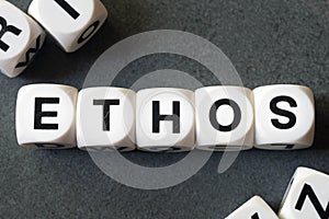 Word ethos on toy cubes