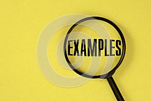 The word EXAMPLE is written on a magnifier on a yellow background