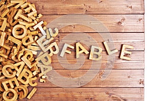 Word fable made with wooden letters