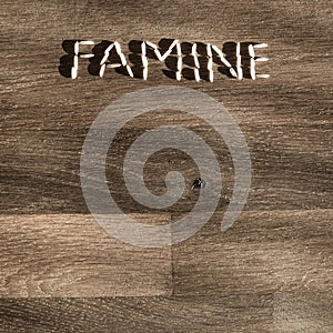 Word famine made of rice grains.