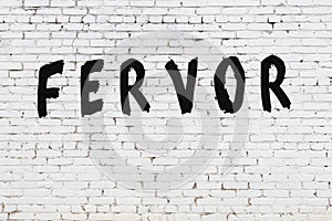 Word fervor painted on white brick wall