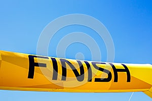 Word Finish on a yellow banner against blue sky