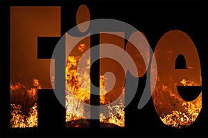 The word FIRE filled in with extreme close up of a wild grass fire in landscape format on black