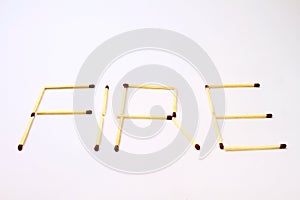 Word fire made out of matches