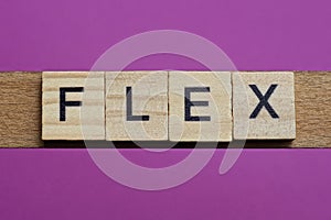 Word flex from small gray wooden letters