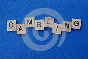 Word gambling made from gray wooden letters