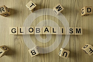 Word globalism from wooden blocks photo
