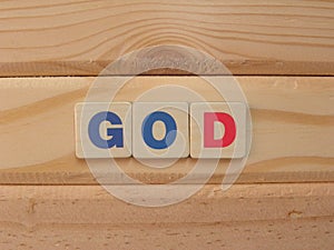 Word God on wood