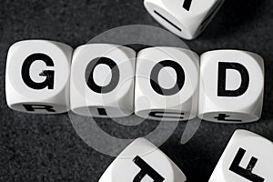 Word good on toy cubes