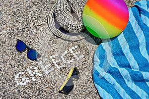 The word Greece made of shells on beach in the sand.