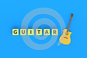 Word guitar on cubes near acoustic instrument on blue background