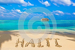 Word Haiti on beach
