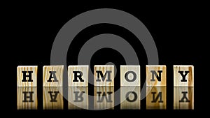 The word - Harmony - on wooden cubes