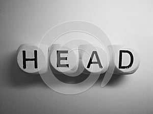 Word head spelled on dice