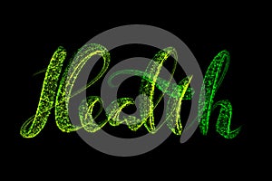 The word health is made of glowing green particles on a black background. Concept of healthcare and Selfisolation photo