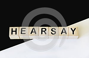 word HEARING on building blocks concept and black and white background