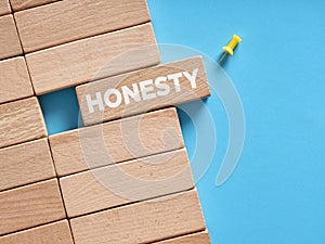 The word honesty written on wooden blocks. Trust, ethics or integrity in business