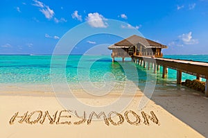 Word Honeymoon on beach