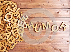 Word humor made with wooden letters