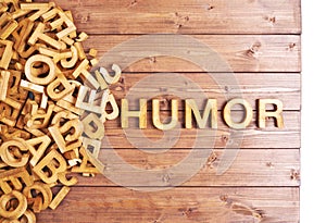 Word humor made with wooden letters