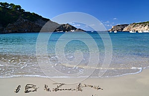 The word Ibiza written in the sand