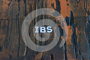 The word ibs written in white block letters