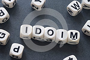 Word idiom on toy cubes photo