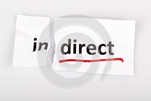 The word indirect changed to direct on torn paper photo