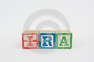 The Word IRA in Wooden Childrens Blocks