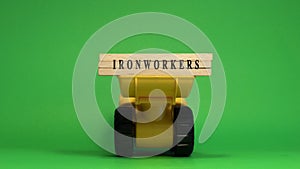 The word Ironworkers is written on wooden sticks. Machine concept. job occupations