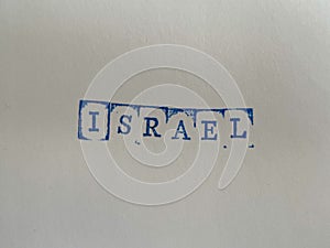 The word Israel written in isolated vintage wooden letterpress type on a white background.