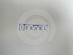 The word Israel written in isolated vintage wooden letterpress type on a white background.