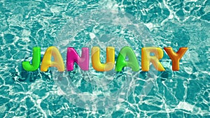 Word `JANUARY` shaped inflatable swim ring floating in a refreshing blue swimming pool