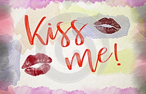 Word Kiss Me with a background of romantic red watercolor brush strokes