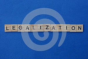 Word legalization made from gray wooden letters photo