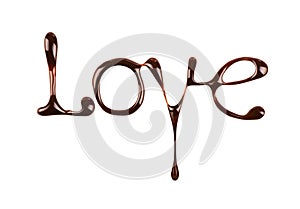 The word Love written by liquid chocolate on white