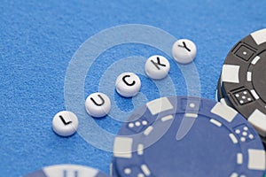 Word`lucky` with poker chips