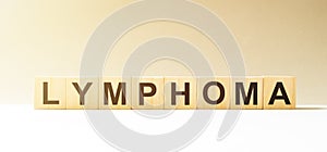 Word lyphoma made with wooden light blocks. Medical concept