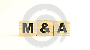 The word MA. Wooden cubes with letters isolated on white background