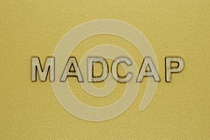 Word madcap made from wooden letters photo