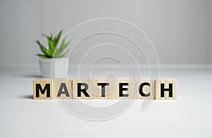 The word MarTech on wooden cubes. business background photo