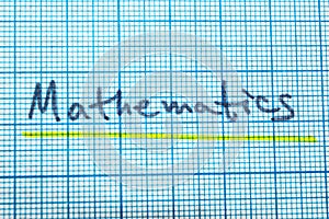 The word mathematics in a notebook for drawing