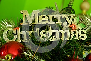 Word of  Merry Christmas on the Christmas Tree
