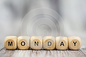 The word Monday on wooden cubes. Weekday concept