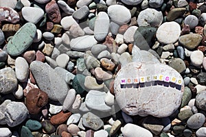 The word Montenegro on the pebbles