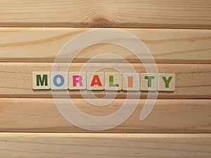 Word Morality on wood