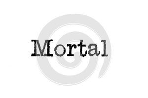 The word `Mortal` from a typewriter on white