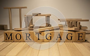 The word mortgage was created from wooden cubes. Business and market.