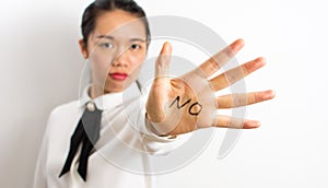 Word No written on businesswoman hand