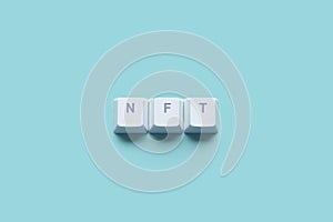 Word Non-Fungible Token NFT written on computer keyboard keys